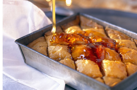 This baklava recipe is a real winner! Layers of buttered filo pastry encase a delicious, nutty, pistachio and walnut filling.