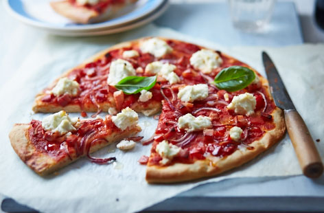 Keep the ingredients for this simple pizza in your storecupboard and fridge, so when you have the urge to phone for a pizza, you can just make it at home instead!