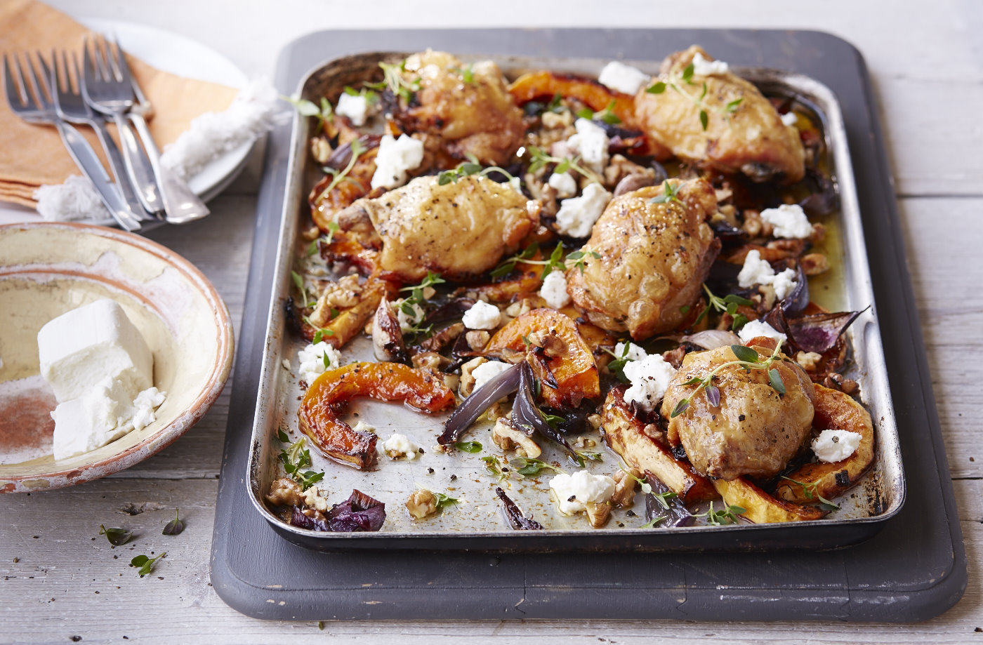 Baked chicken thighs with butternut squash and goat’s cheese recipe