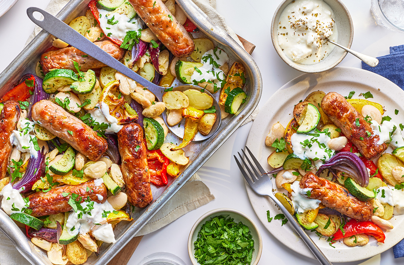 Greek-style sausage and butter bean traybake recipe