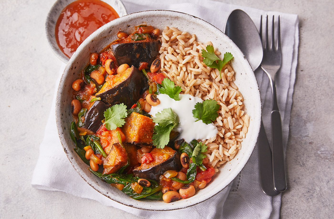 Aubergine, black-eyed bean and spinach curry recipe