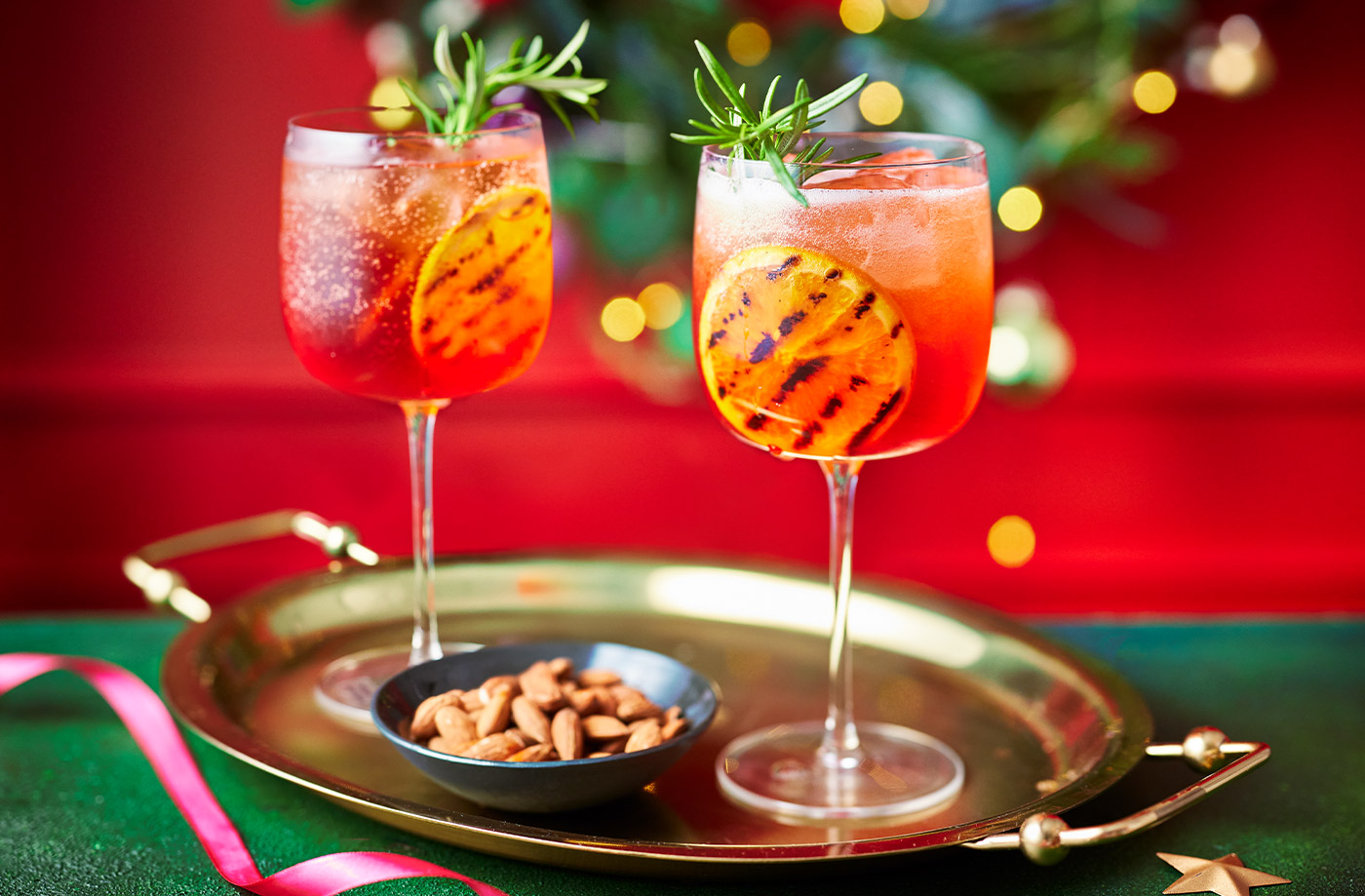 Charred orange and cranberry Aperol spritz recipe