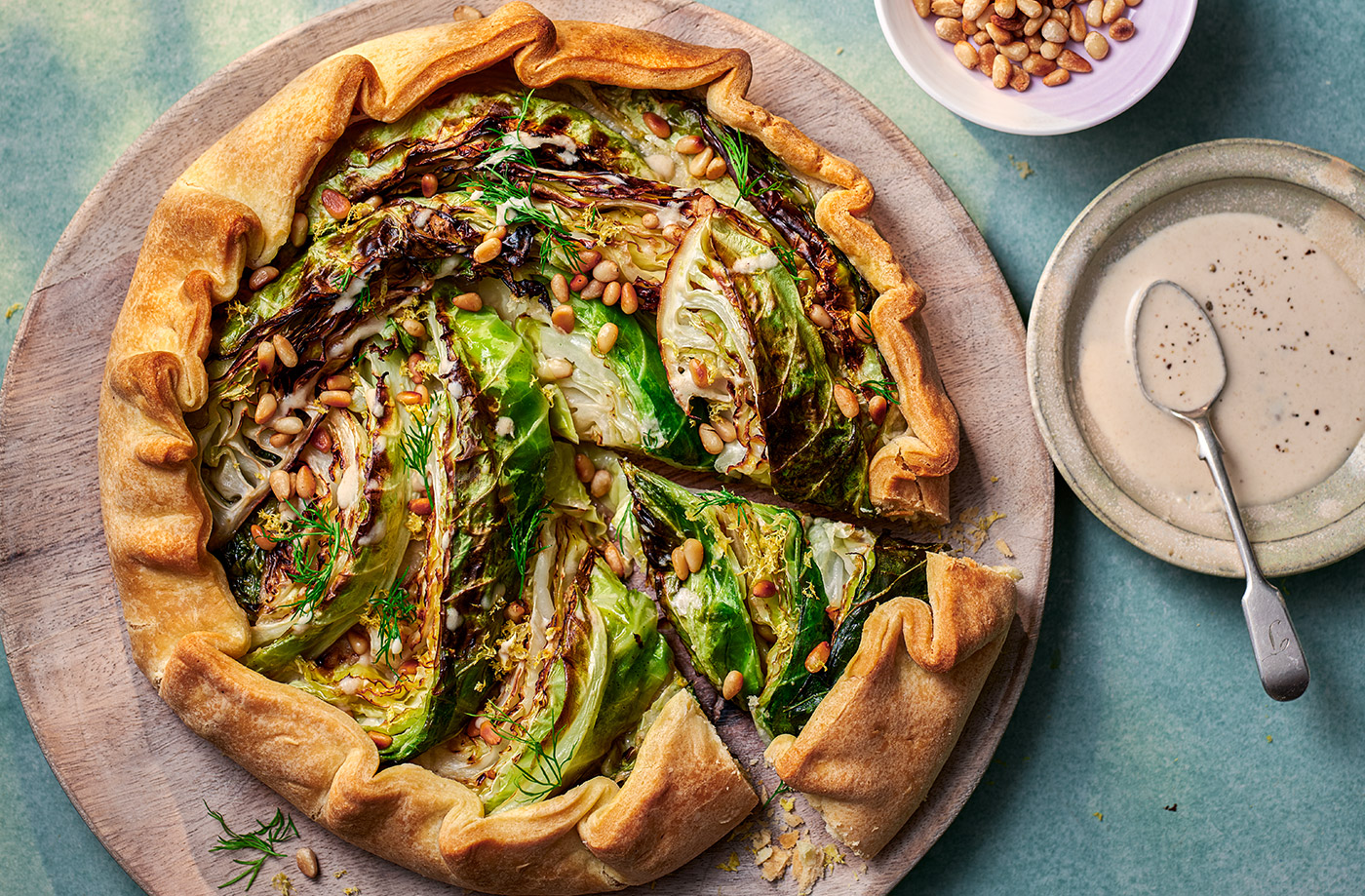 Charred cabbage galette with roasted garlic and tahini recipe