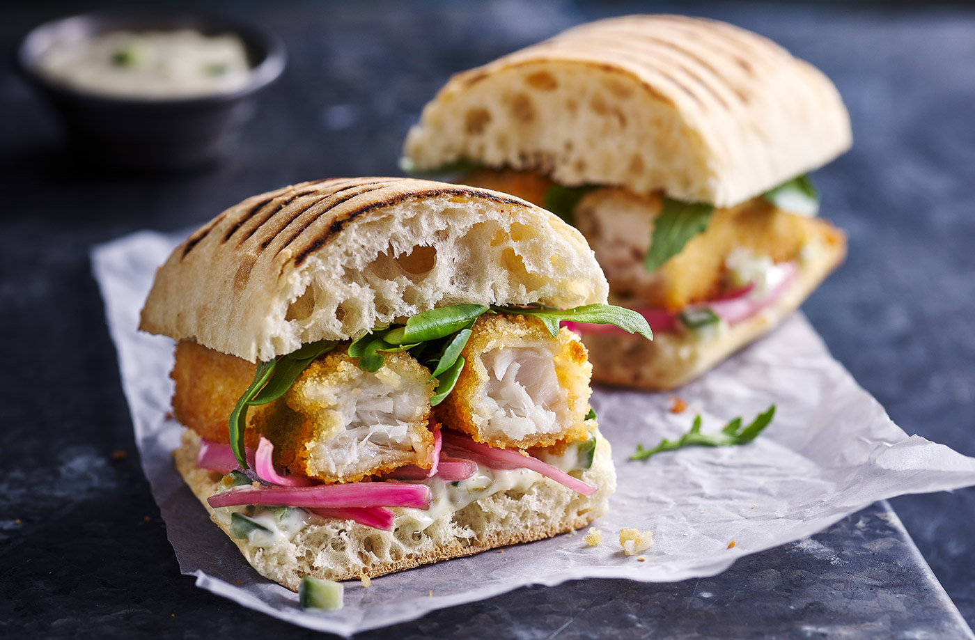 Fish finger and pickled pink onion panini recipe