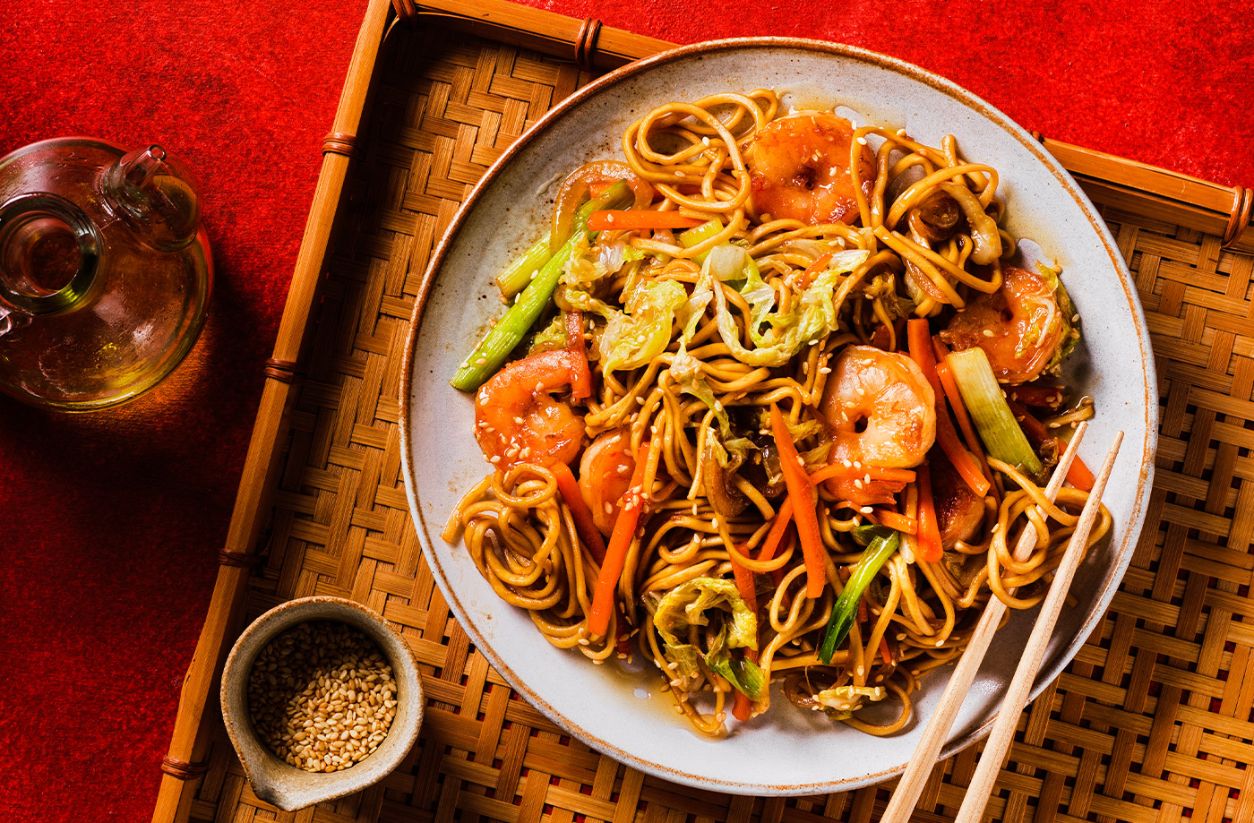 Golden 'long life' noodles with velvet king prawns recipe