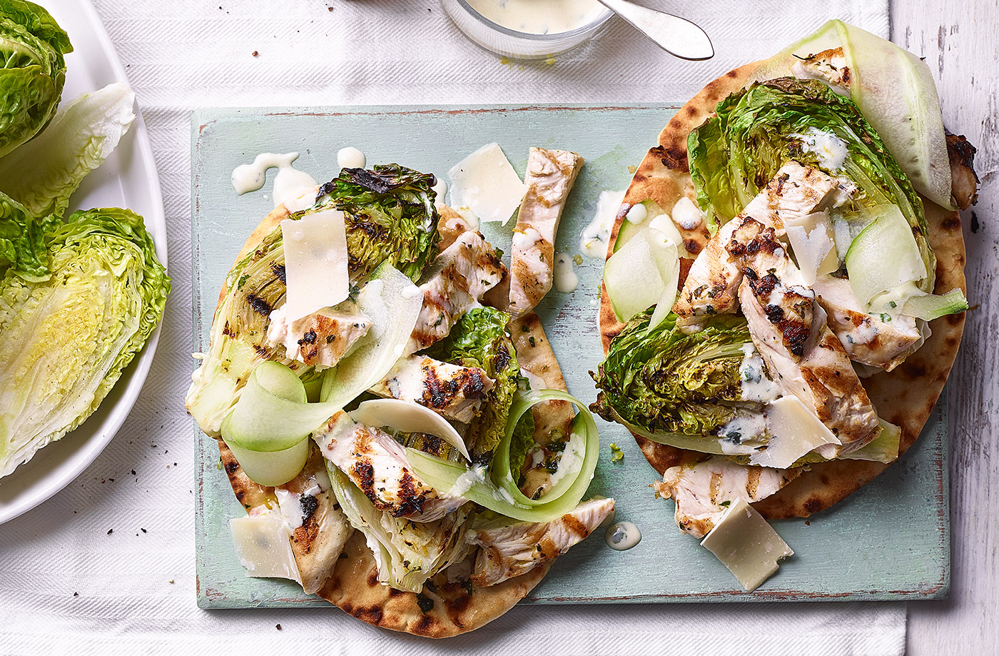 Grilled chicken Caesar salad with herby flatbreads recipe