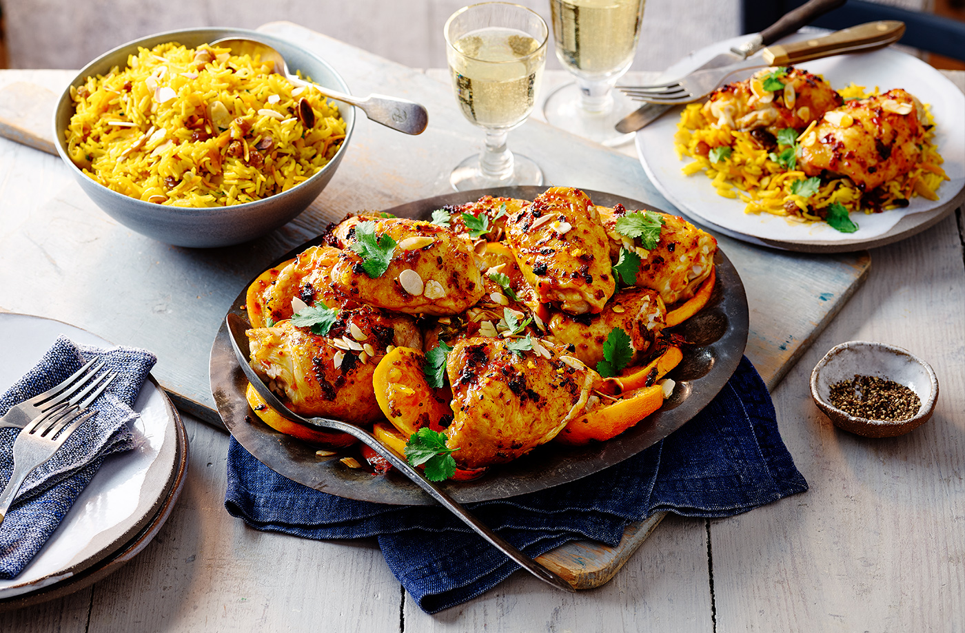 Harissa and orange chicken thighs with spiced rice recipe