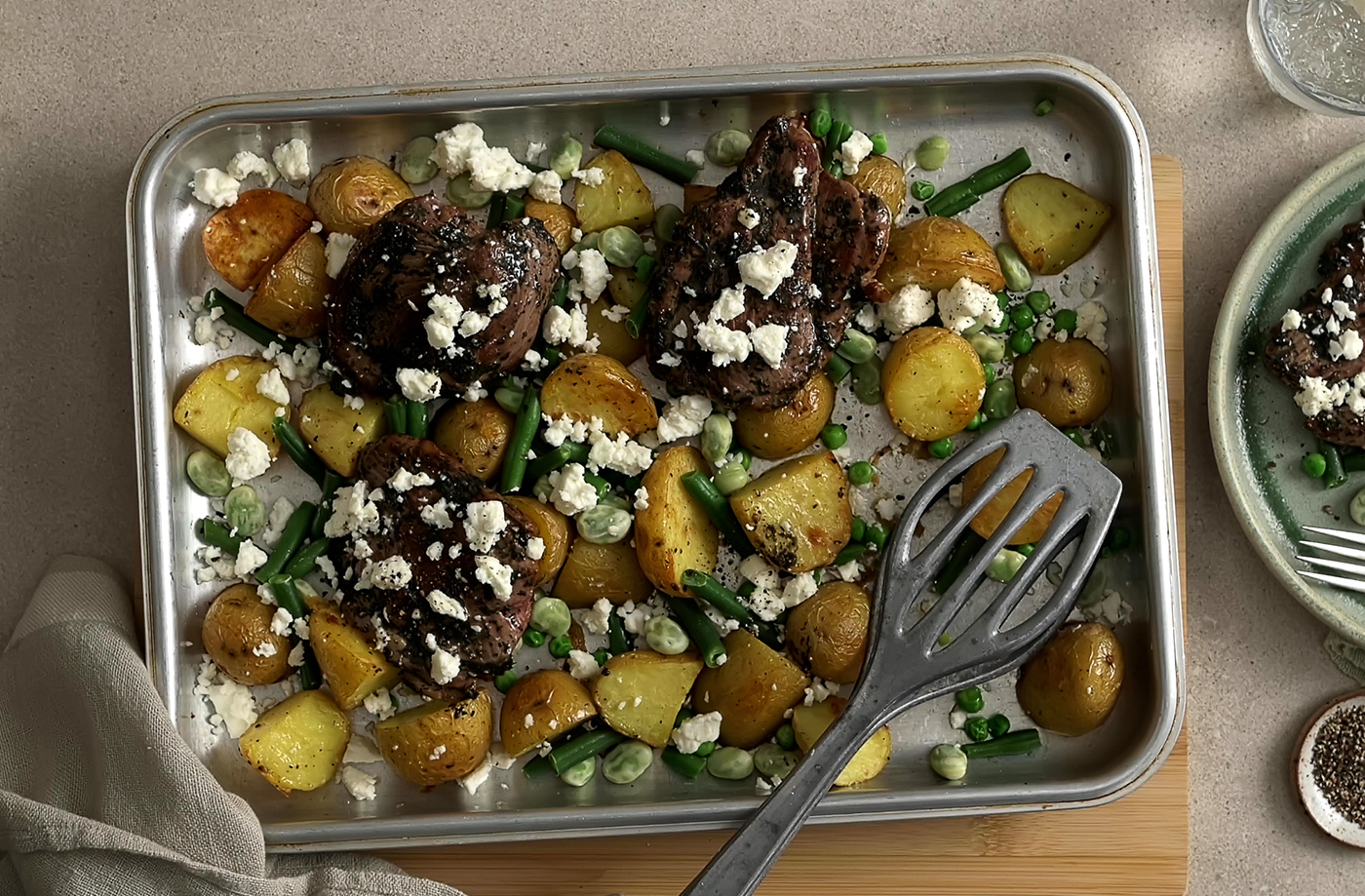 Lamb, mint and spring veg traybake recipe