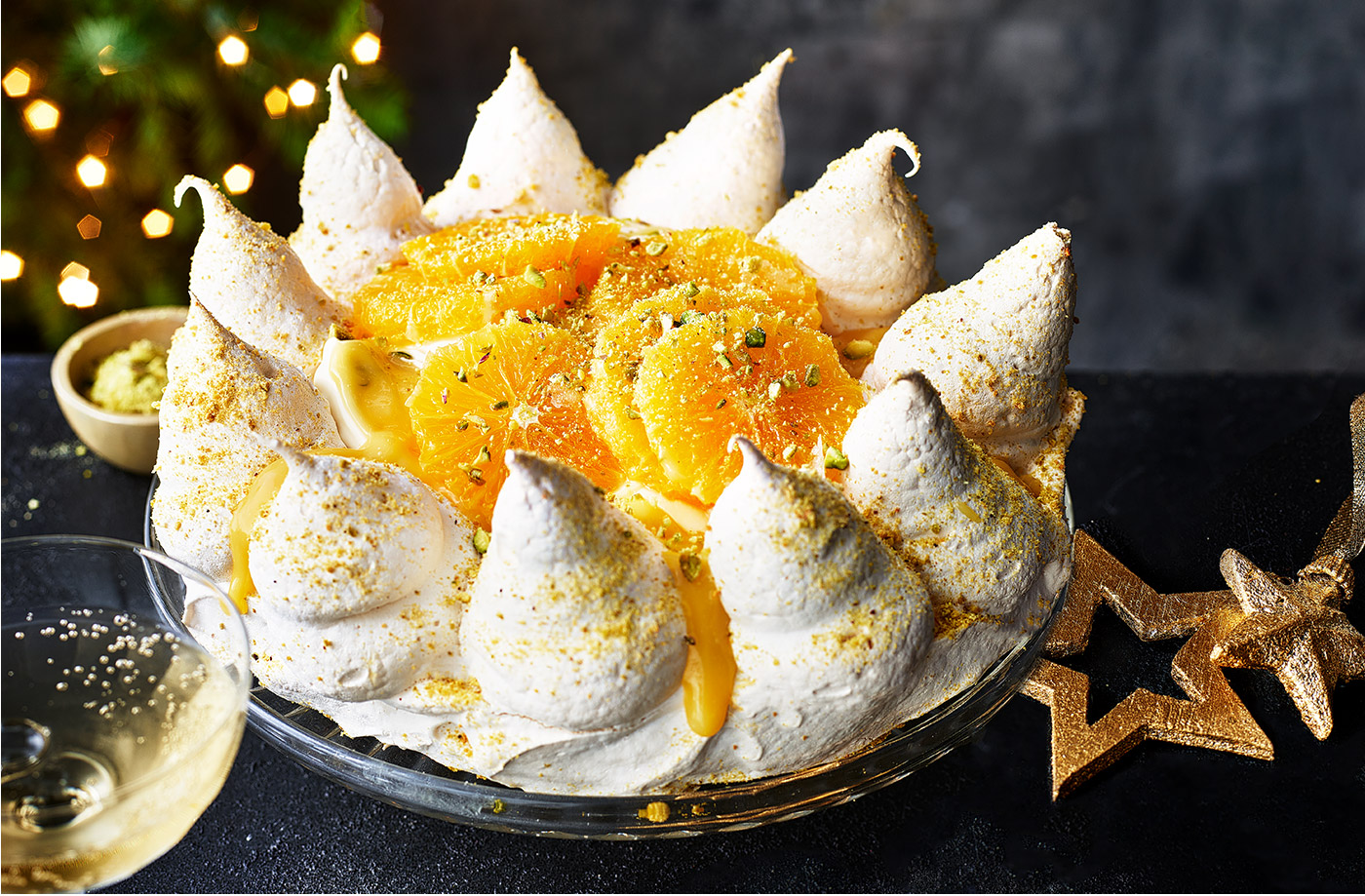 Orange, cardamom and pistachio pavlova crown recipe