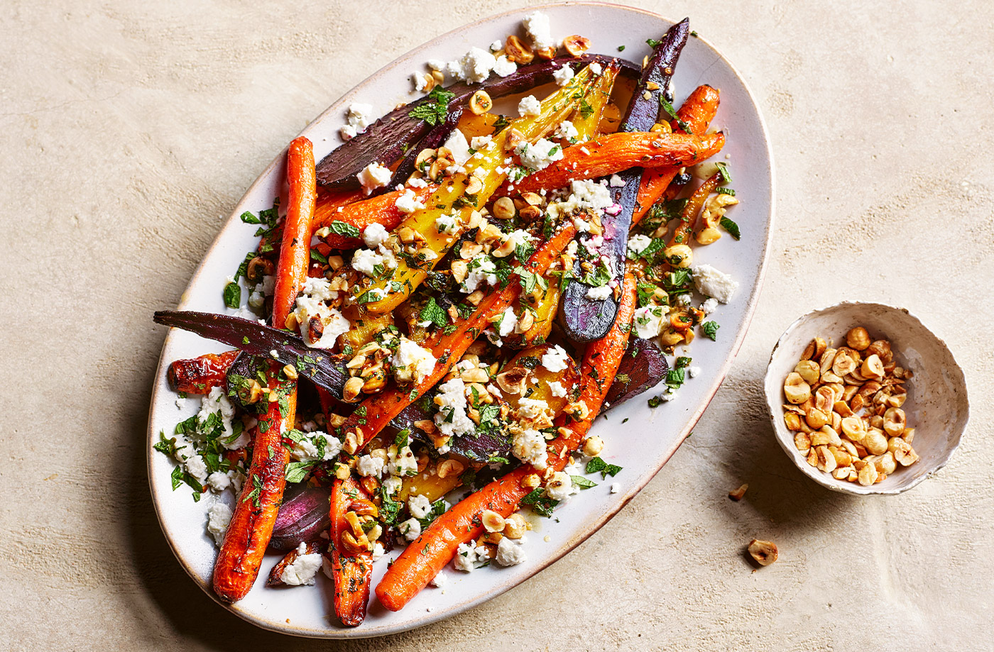Rainbow carrots with feta and hazelnut recipe