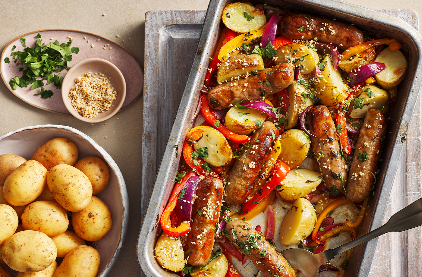 Sausage and Jersey Royal traybake recipe