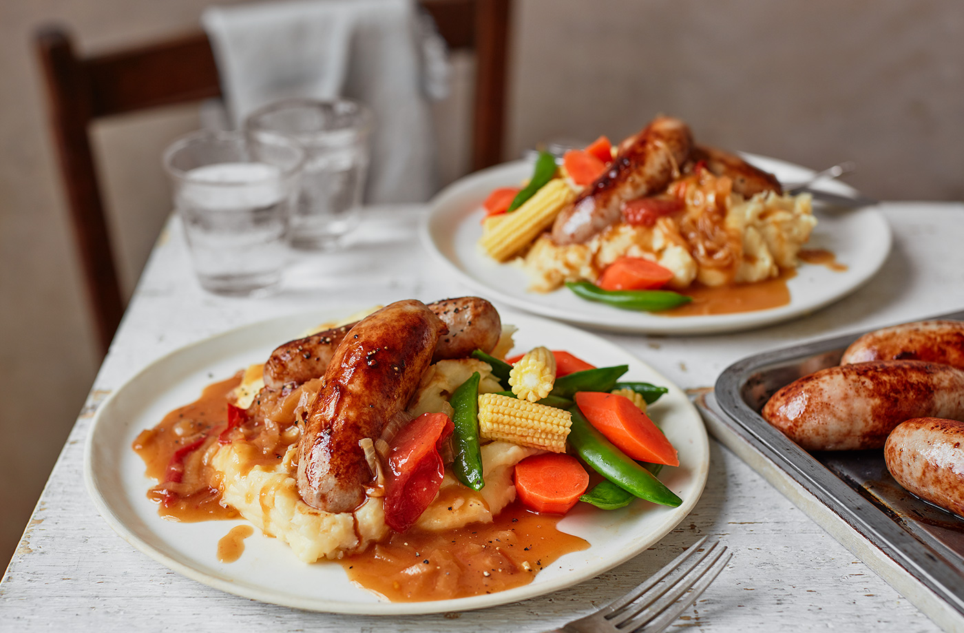 Sausage and cheesy mash with tomato gravy  recipe