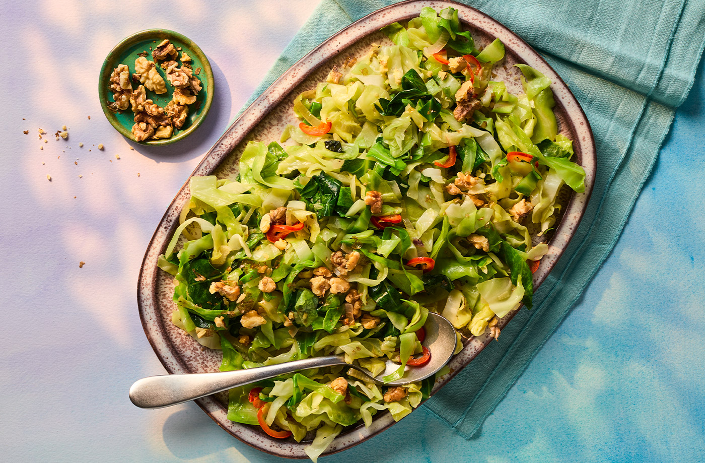 Shredded cabbage with shallots and walnuts recipe