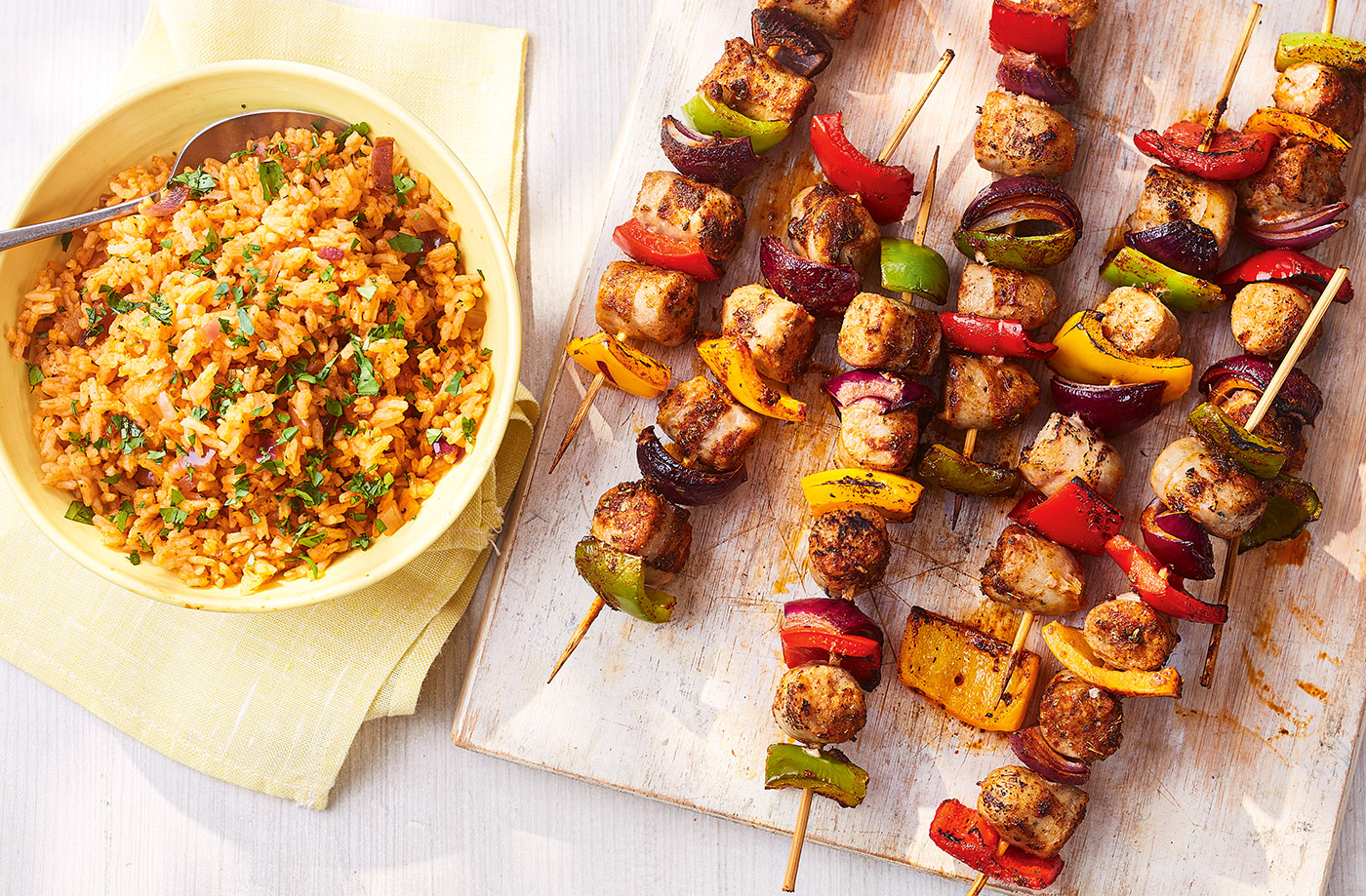 Smoky sausage skewers with tomato rice recipe
