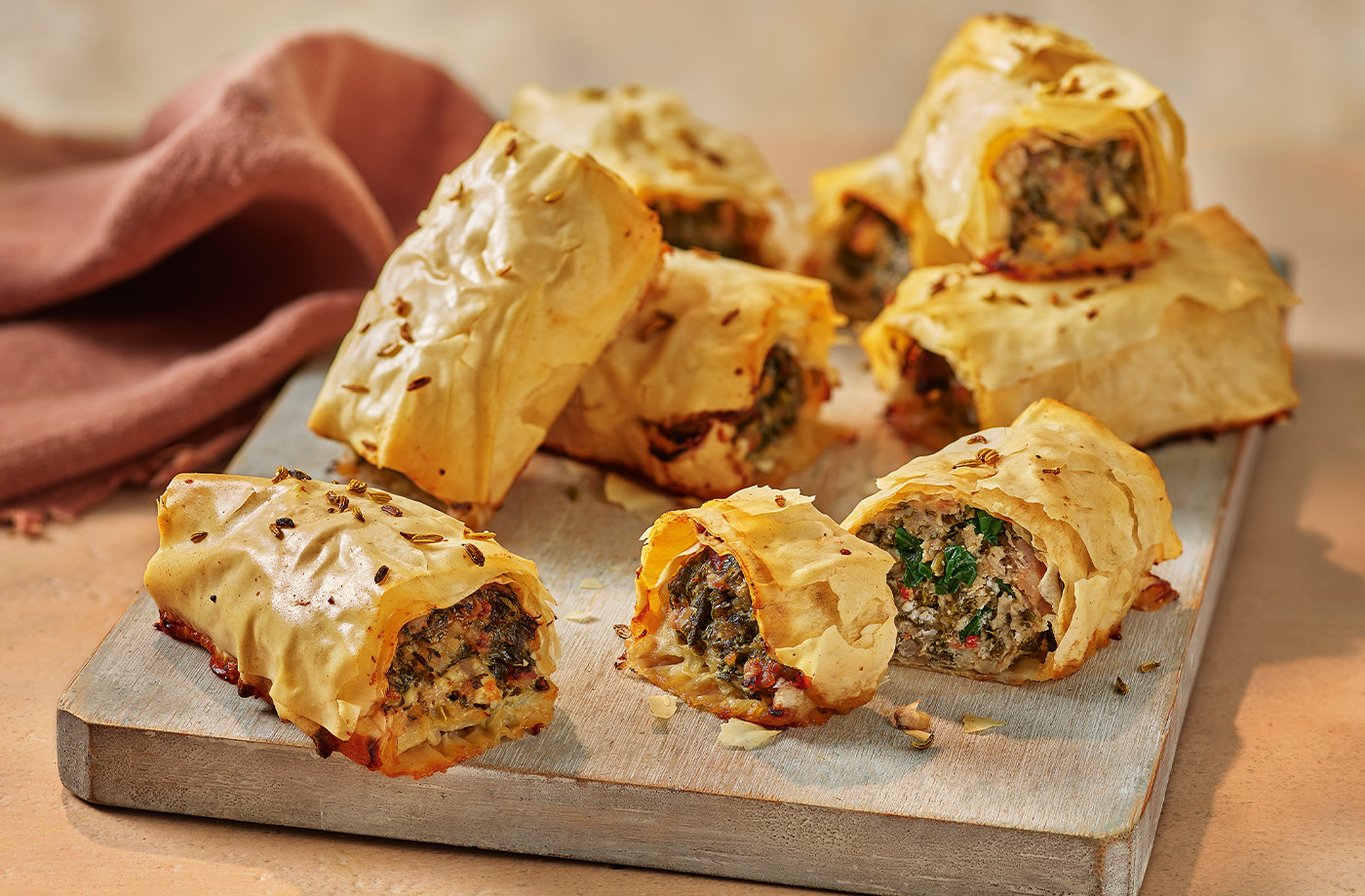 Spanakopita sausage rolls recipe