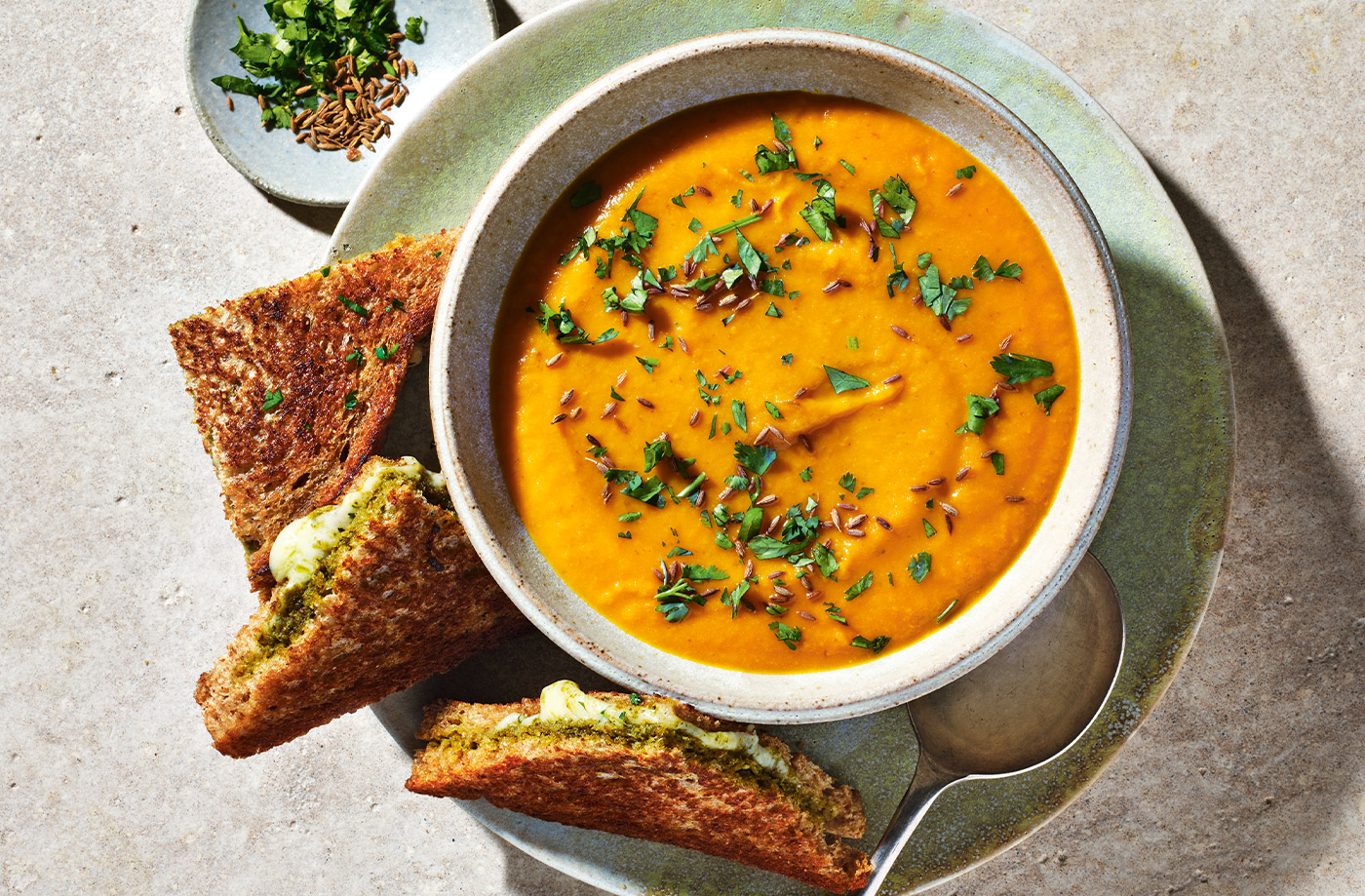 Spiced carrot and lentil soup with cheesy pesto toasties recipe