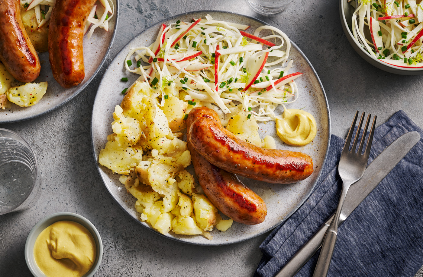 Sausages with fennel, apple and cabbage slaw  recipe