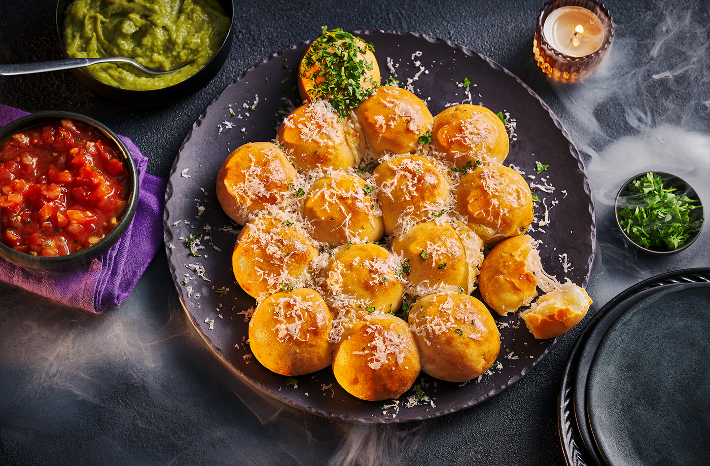 Pumpkin-shaped tear and share cheesy doughballs recipe