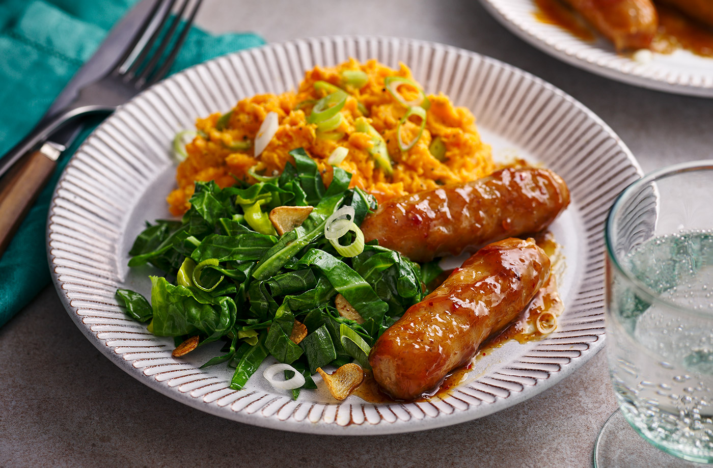 Teriyaki-glazed sausages with sweet potato mash recipe