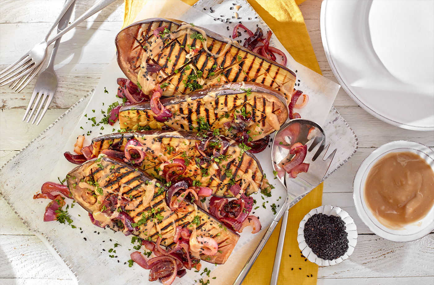 Whole blackened aubergine with caramelised onions recipe