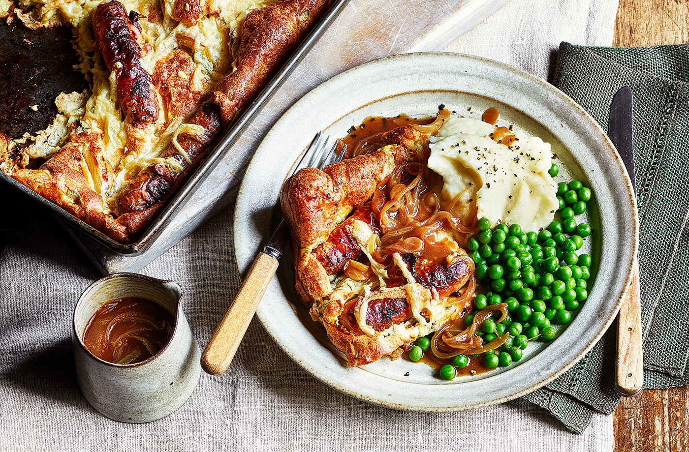 Cheese and onion toad-in-the-hole with mash, peas and gravy recipe