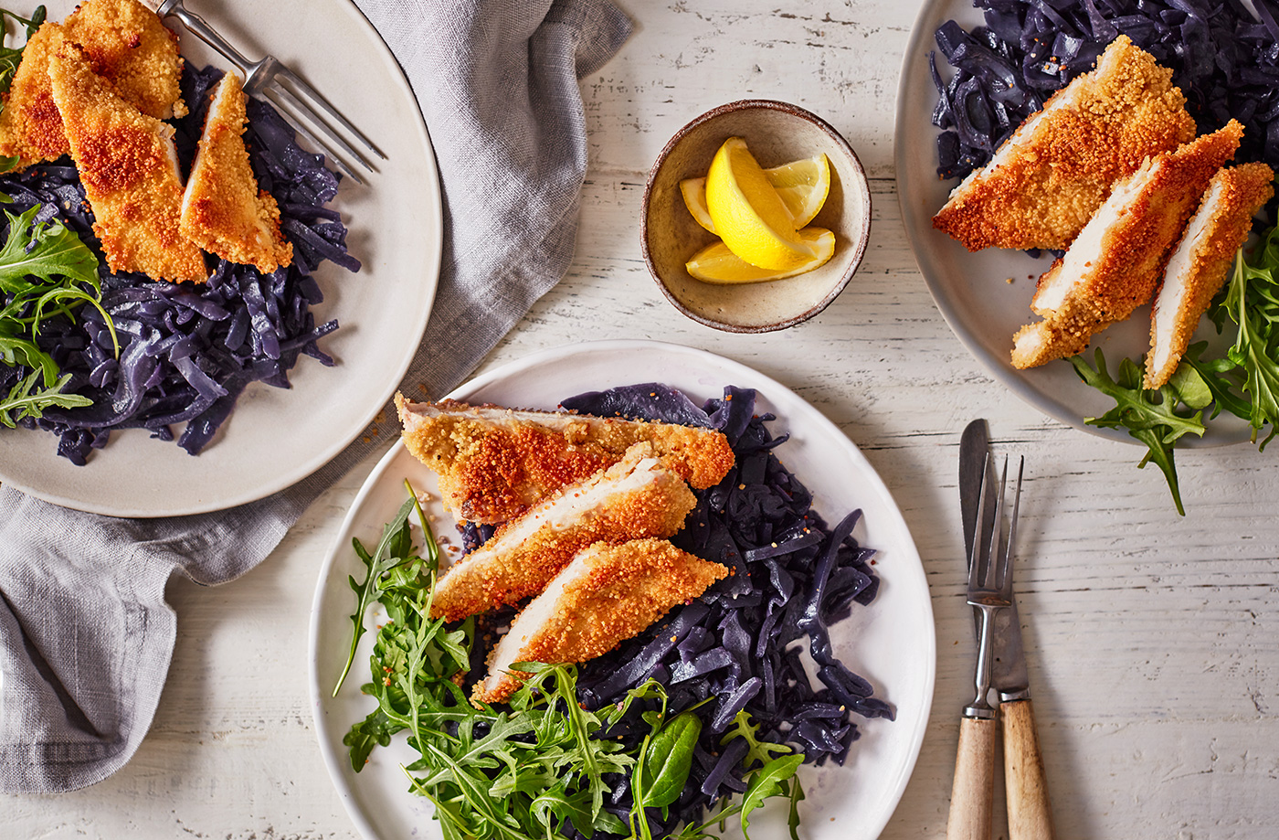 Couscous chicken schnitzel with red cabbage and rocket recipe