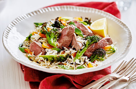 This quick and simple lamb dish with wild rice and apricot salad is a fuss-free, flavour packed family recipe that's good for you too.