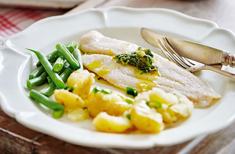 Fresh fish is at its finest when simply baked, and this dish pairs succulent baked white fish with fluffly crushed potatoes, green beans and tangy watercress salsa