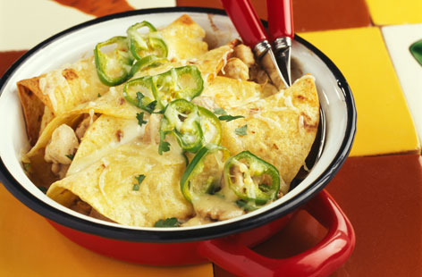 Enchiladas are a dish that the whole family can enjoy, and one that's just as easy to make. This recipe for pork and chicken enchiladas, topped with golden and bubbling Monterey Jack cheese, is the perfect entry point into Mexican cooking.