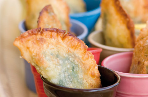 These meat-free empanadas are great fun to make if you have a few crafty hours on your hands: A kind of miniature pasty with a cheddar cheese, spinach and potato filling enveloped in a golden and rich pastry, and a great party or film night snack.