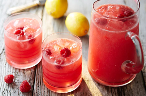 Brimming with fresh raspberries and zesty lemon, this pretty pink lemonade is sure to be a hit at picnics