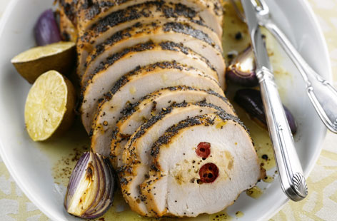 Crunchy roast turkey stuffed with dried apricot and cranberries, served with lime and onions