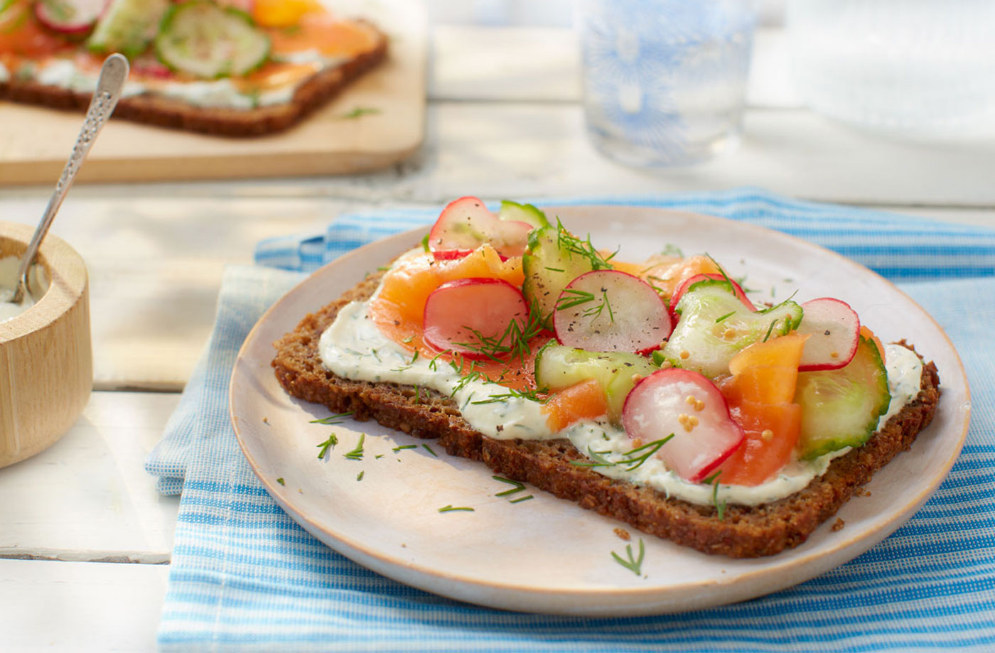 Smoked salmon and rye bread with pickled radishes and cucumber recipe