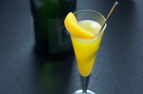 Sum up summer in a drink with this gorgeous bellini. This sparkling cocktail combines prosecco and peach: the sweet flavours of the stone fruit make for a light, refreshing, elegant tipple. Fresh peach is used in the purée, while the garnish is tinned peach.