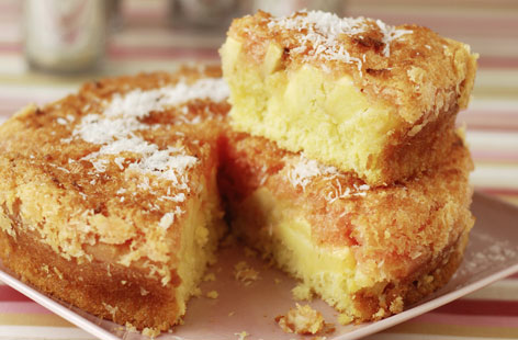 An easy apple and coconut cake recipe made moist with the addition of Greek yogurt and fresh, tangy apples.