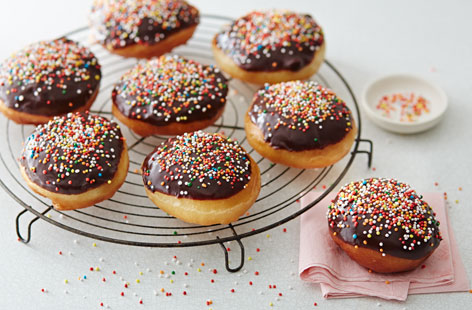 Doughnuts topped with sprinkles are sure to make you smile, and these chocolate dipped doughnuts won't disappoint