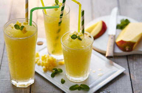 We've given the traditional slushie a grown-up twist with fresh mango, mint and rum.