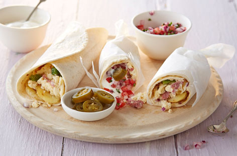 If you've never had a breakfast burrito before, now's the time to change it. Fillings vary, but this one is a great way of using up eggs and potatoes – it also has a lovely kick from the pastrami and jalapeños.