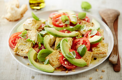This twist on the Italian classic salad replaces the usual mozzarella with slices of tofu marinated in lemon, oregano and olive oil