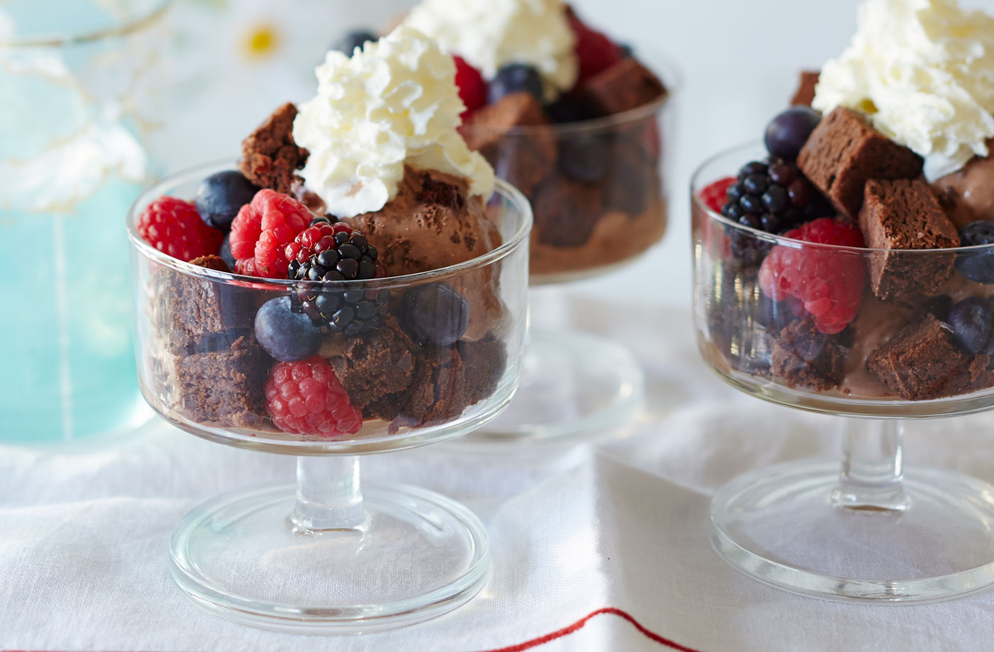Brownie and summer berry sundae with cream  recipe