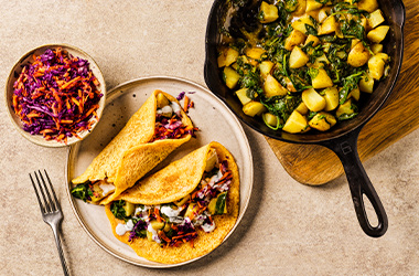 Red lentil dosa pancakes with potato and spinach