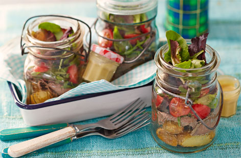 Perfect for a picnic, this summer salad features layers of sliced  roast beef, new potatoes and a horseradish dressing