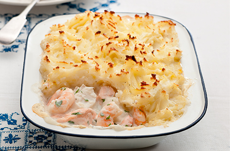As comforting and delicious as it is easy to make, this creamy fish pie is the meal your dinner table has been waiting for. Dig through the bed of cloudy mashed potatoes on top to reach the creamy, garlicky seafood mix inside and you'll be in heaven in no time.