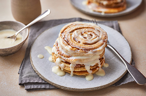 Cinnamon roll pancakes... yep, you read that right! We've merged cinnamon rolls with pancakes for the ultimate autumn breakfast dish. Top with a generous helping of cream cheese icing and get stuck in.