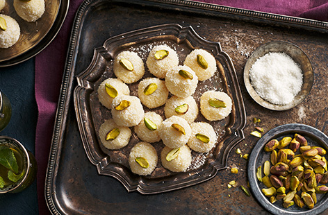 Sweeten up your celebrations with these coconut ladoo - traditional Indian sweet balls made from coconut, cardamon and condensed milk