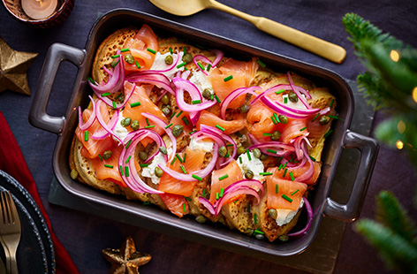 Stretch a pack of smoked salmon to feed 6 with our budget-friendly breakfast. This crumpet bread and butter pudding is the perfect way to kick off your Christmas Day morning.