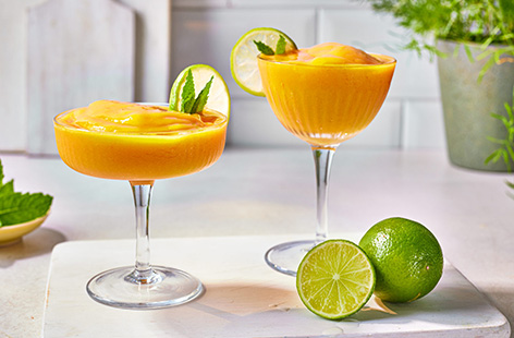 Cool off this summer with our refreshing mango daiquiri slushie. Made using frozen mango, this cooling cocktail is super easy.