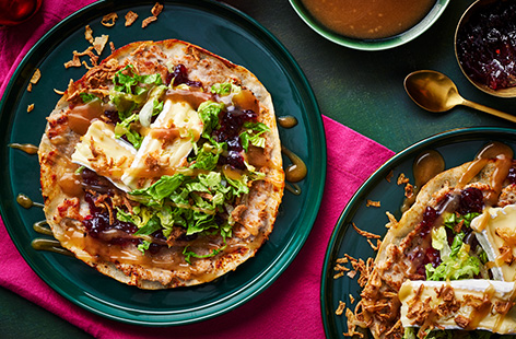 Packed with all the flavours of a Christmas dinner, these smash tacos are loaded with crispy turkey mince, Brie and cranberry sauce. Serve with a pot of gravy for dipping to take these festive tacos to the next level.