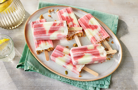 Keep the kids cool with a smoothie ice lolly. Made with just three ingredients - yogurt, frozen smoothie mix and granola, not only are they easy to rustle up, they taste great too.