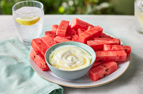 Turn watermelon into 'fries' for a fun and fruity snack for kids. Serve with honey-swirled Greek yogurt and get dipping!